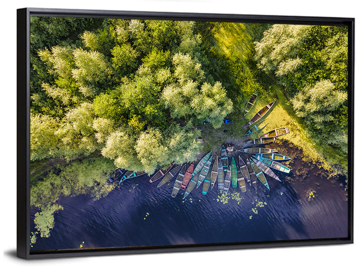 Cluster of Boats Along Forest Shore Wall Art as a framed canvas