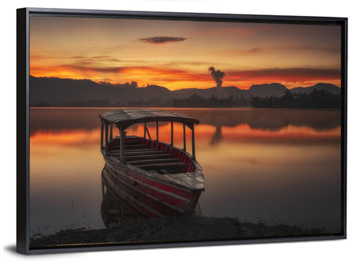 Sunset Fishing Boat on Calm Lake Wall Art as a framed canvas
