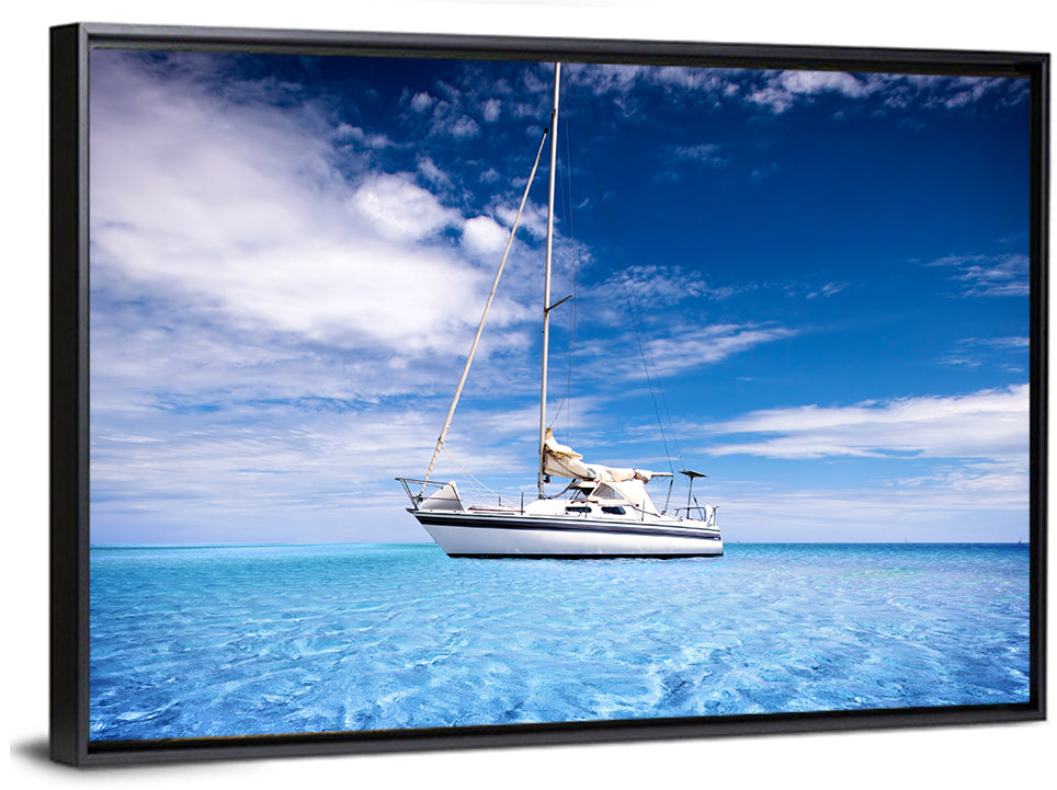 Furled Sails Over Turquoise Water Wall Art