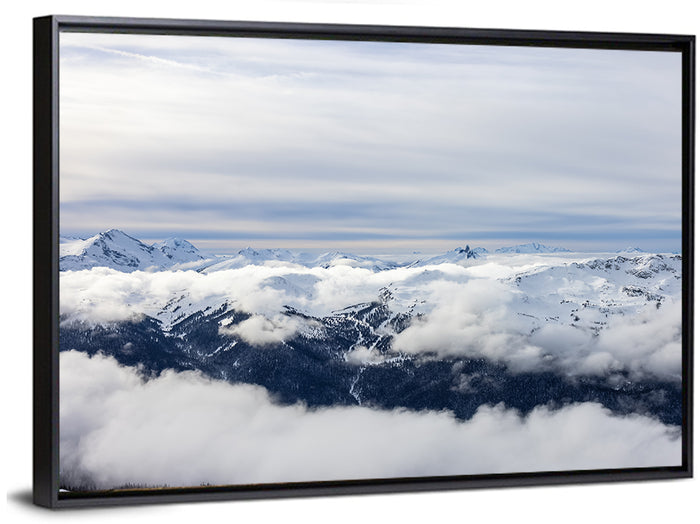 Snow-capped Whistler Peaks Wall Art as a framed canvas