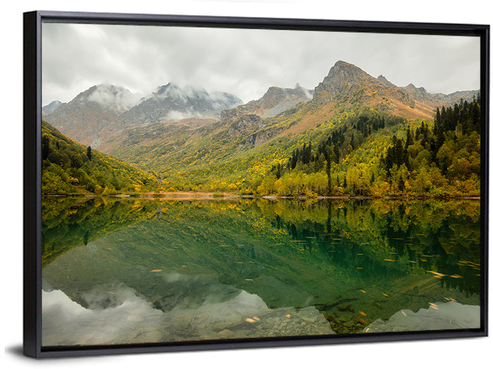 Kardyvach Lake Reflection Under Clouded Peaks Wall Art as a framed canvas