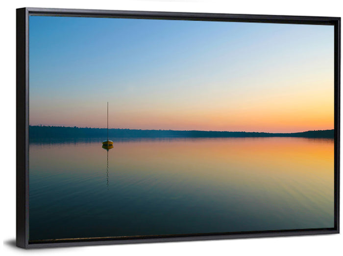 Cyprus Lake Sunset Boat Wall Art as a framed canvas