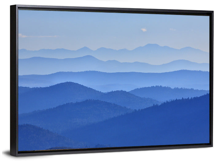 Misty Blue Mountain Valley Wall Art as a framed canvas