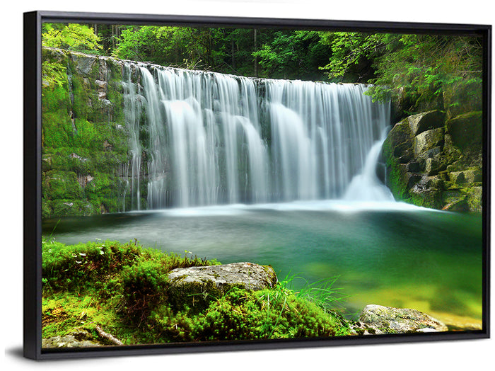 Emerald Forest Waterfall with Mossy Stones Wall Art as a framed canvas