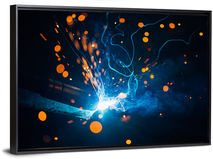 Bright Blue Welding Sparks Wall Art as a framed canvas
