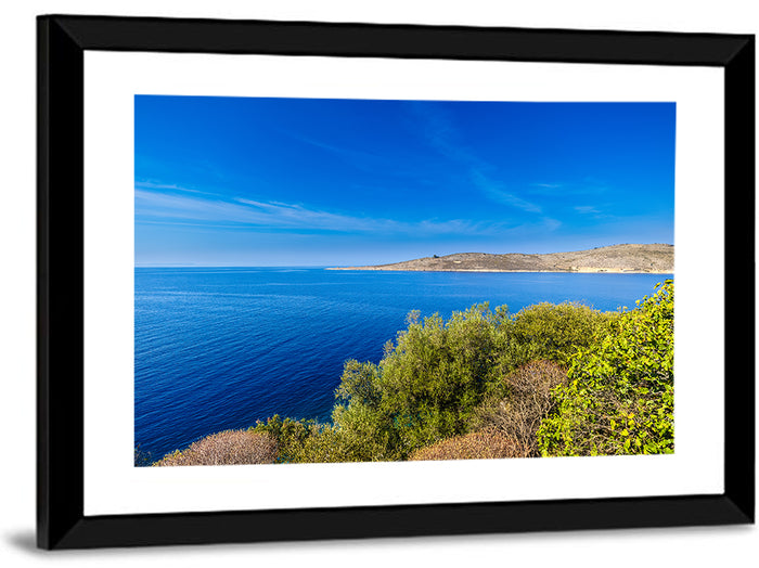 Sunlit Albanian Coastline Wall Art as a framed print