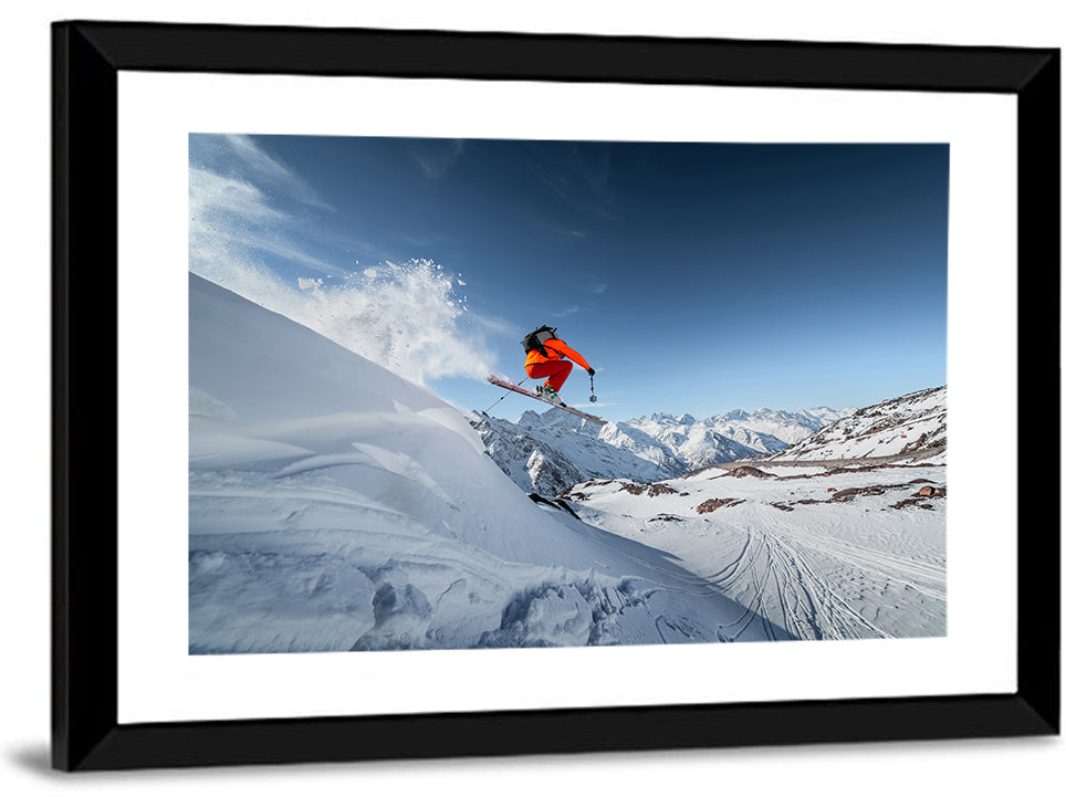 Airborne Skier Over Snowy Mountains Wall Art