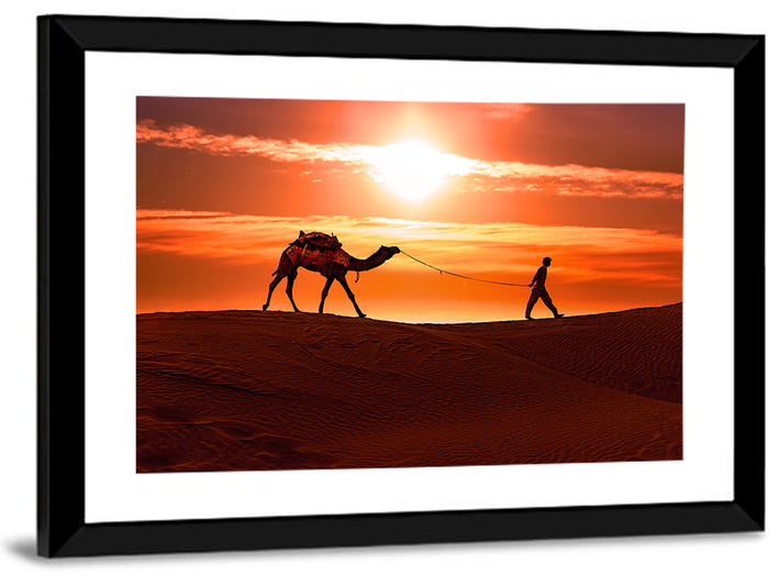 Man Leading Camel at Dusk Wall Art as a framed print