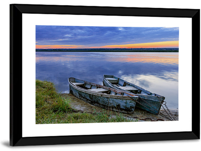 Chained Rowboats at Dusk Wall Art as a framed print