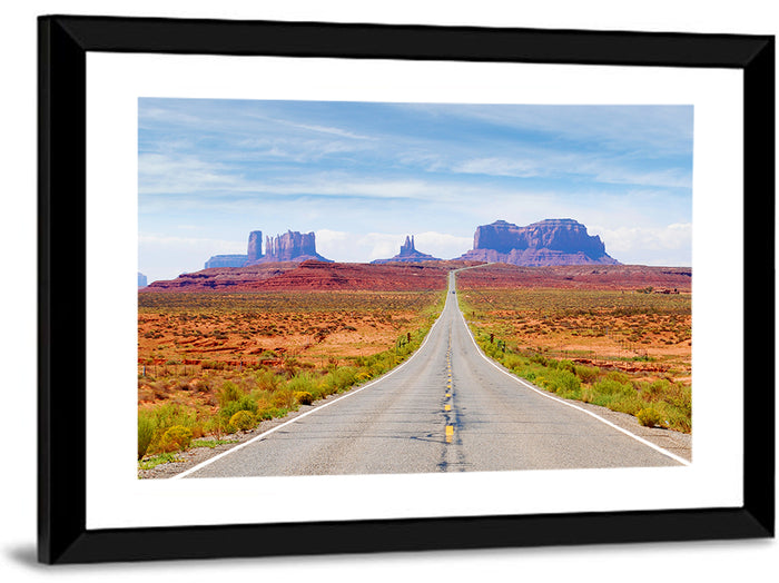 Highway 163 Into Monument Valley Wall Art as a framed print
