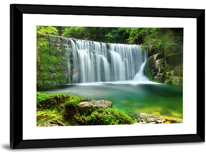 Emerald Forest Waterfall with Mossy Stones Wall Art as a framed print