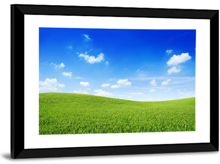 Rolling Green Meadow Under Blue Sky Wall Art as a framed print