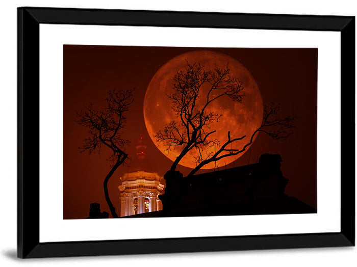 Haunted Supermoon Over Church Spire Wall Art as a framed print