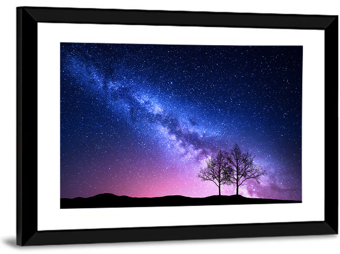 Milky Way Nebula Sky with Silhouetted Trees Wall Art as a framed print