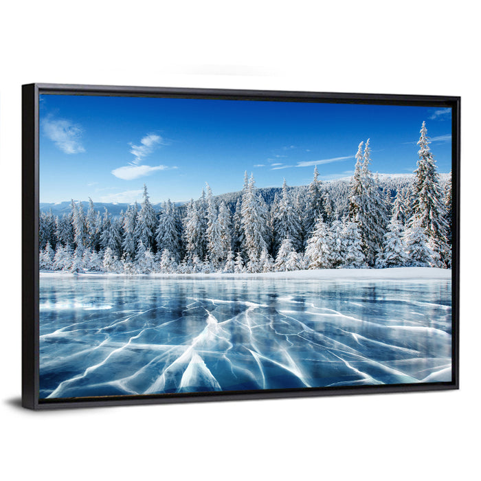 Cracked Ice Lake with Snowy Pines Wall Art as a framed canvas