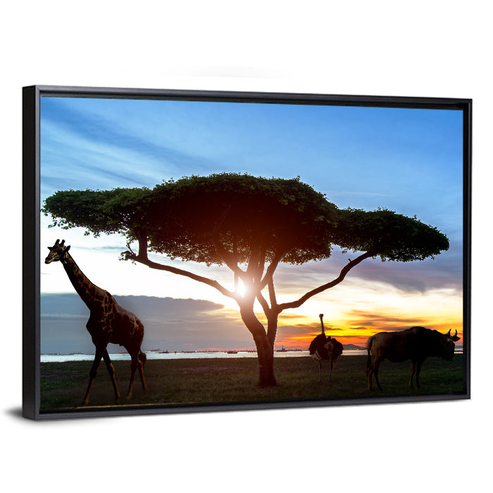 Savanna Silhouettes at Golden Hour Wall Art as a framed canvas