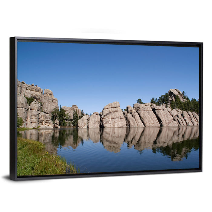 Sylvan Lake Reflection Wall Art as a framed canvas