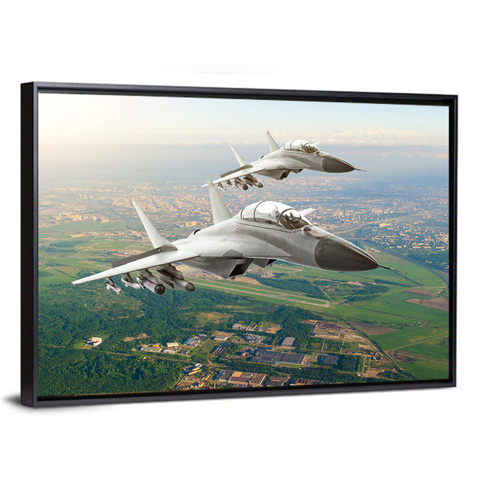 Twin Fighter Jets Over Cityscape Wall Art as a framed canvas