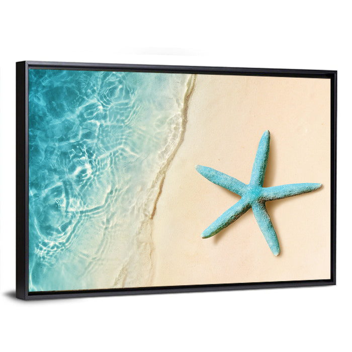 Blue Starfish on Sandy Beach Wall Art as a framed canvas