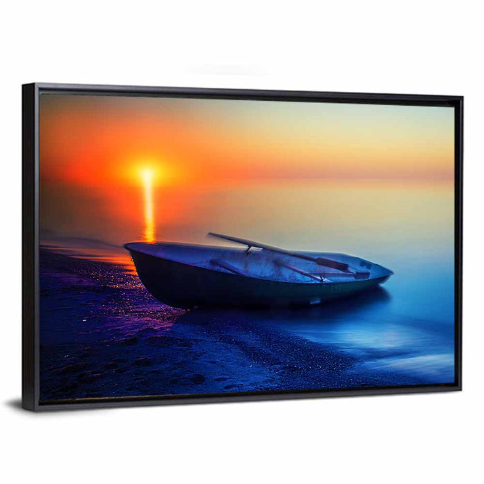 Rowboat on Sandy Shore at Sunset Wall Art as a framed canvas