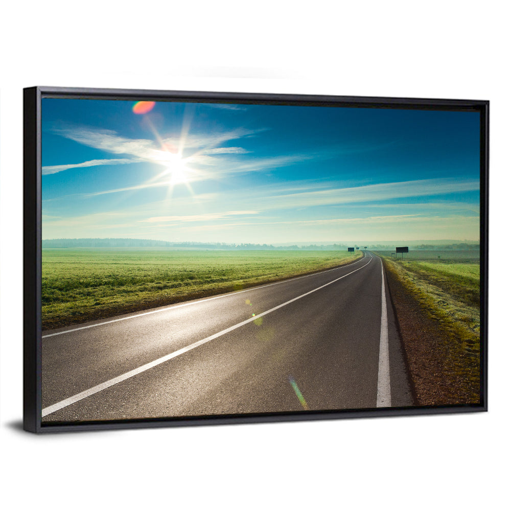 Sunlit Road Through Green Field Wall Art