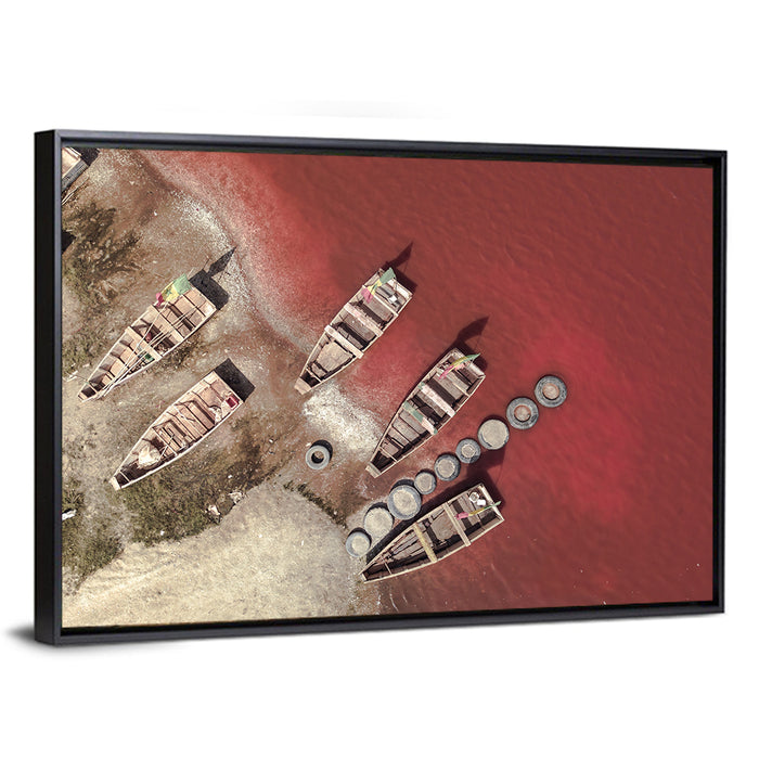 Wooden Boats on Lake Retba Wall Art as a framed canvas
