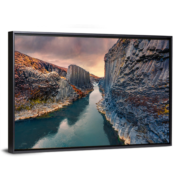 Studlagil Canyon at Sunset Wall Art as a framed canvas