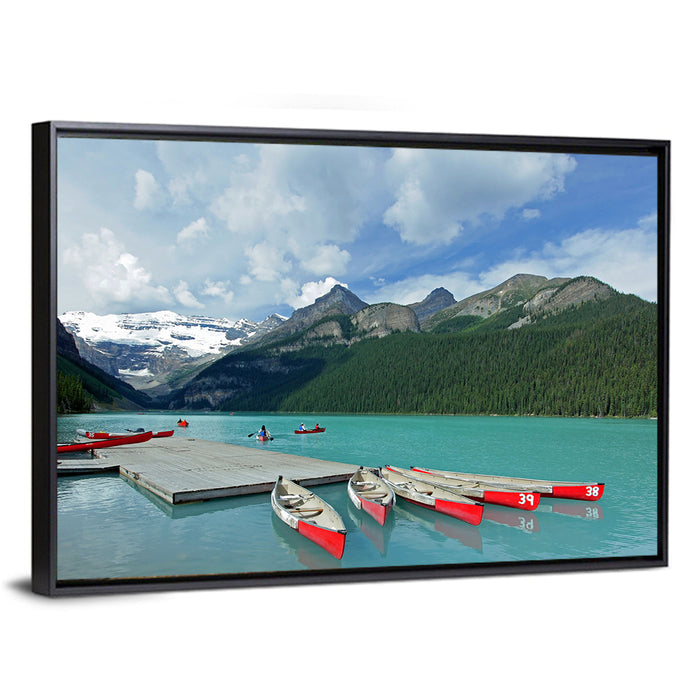 Red Canoes at Lake Louise Wall Art as a framed canvas