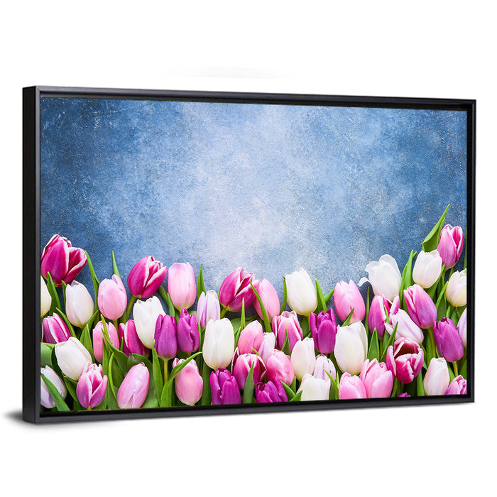 Tulips on Textured Blue Wall Art as a framed canvas