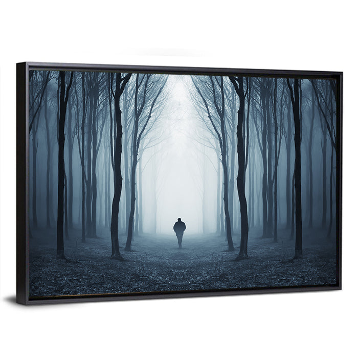 Lone Figure in Misty Forest Wall Art as a framed canvas