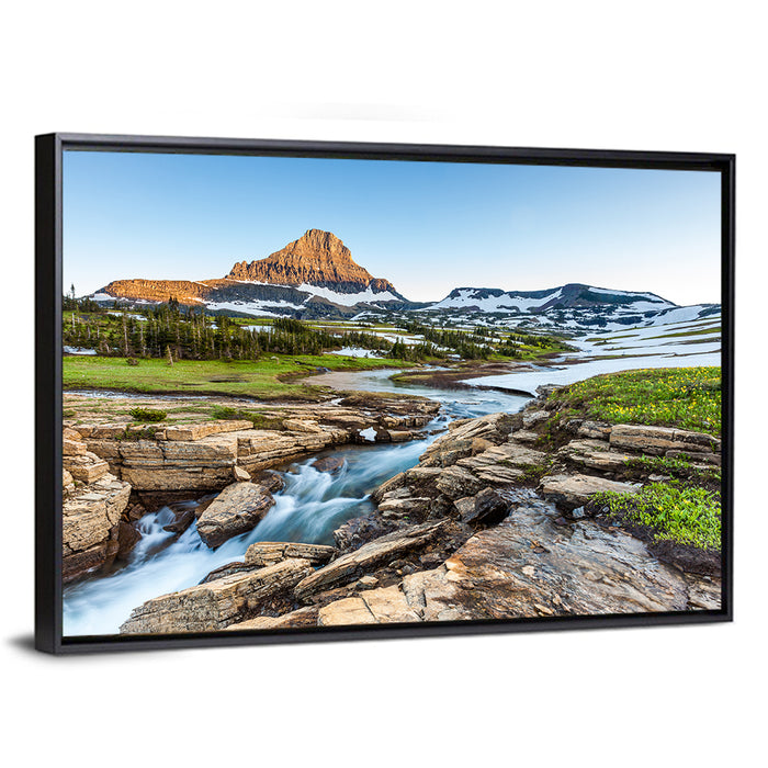 Logan Pass Golden Hour Wall Art as a framed canvas
