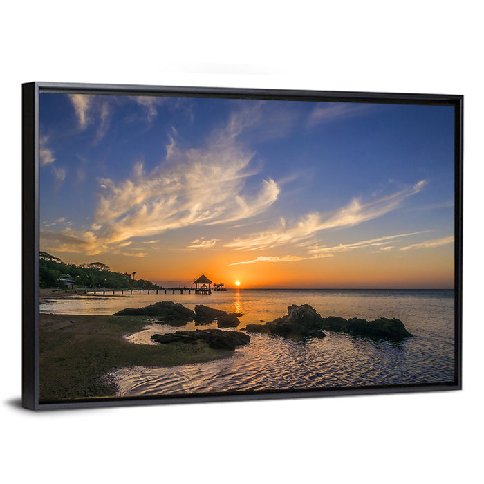Roatan Pier Sunset Wall Art as a framed canvas