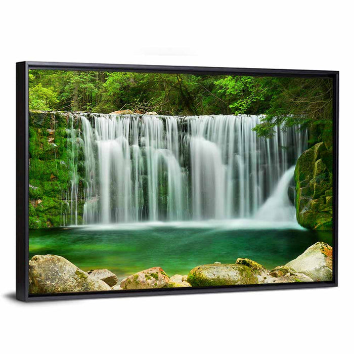 Emerald Lake Waterfall Wall Art as a framed canvas