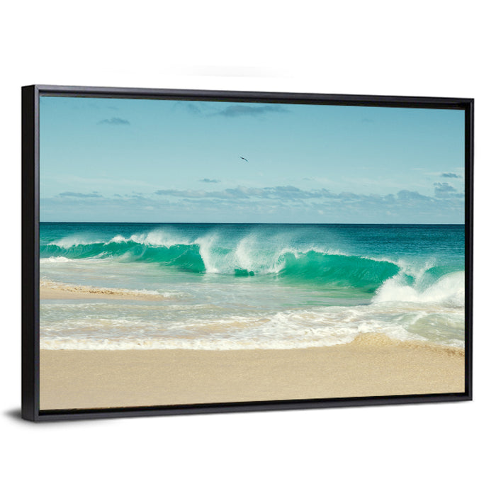 Turquoise Wave on Sandy Beach Wall Art as a framed canvas