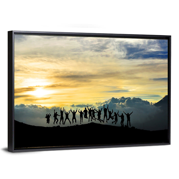 Golden Team Silhouettes at Sunset Wall Art as a framed canvas