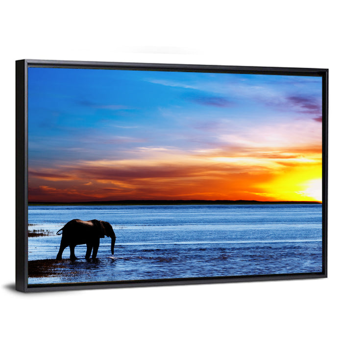 Elephant Silhouette at Beach Sunset Wall Art as a framed canvas