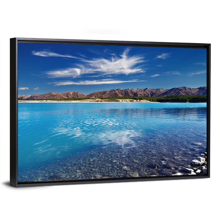 Lake Pukaki Pebble Shore Wall Art as a framed canvas