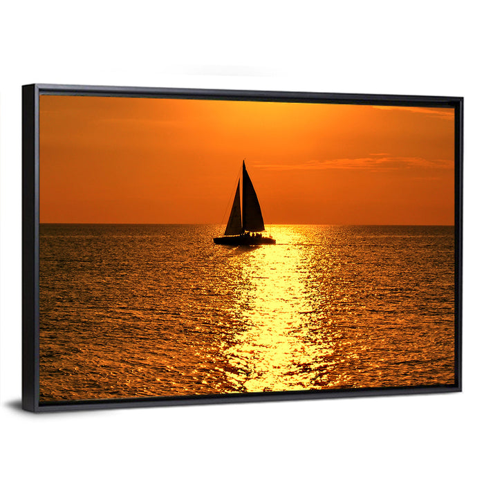 Sailboat Silhouette at Golden Sunset Wall Art as a framed canvas
