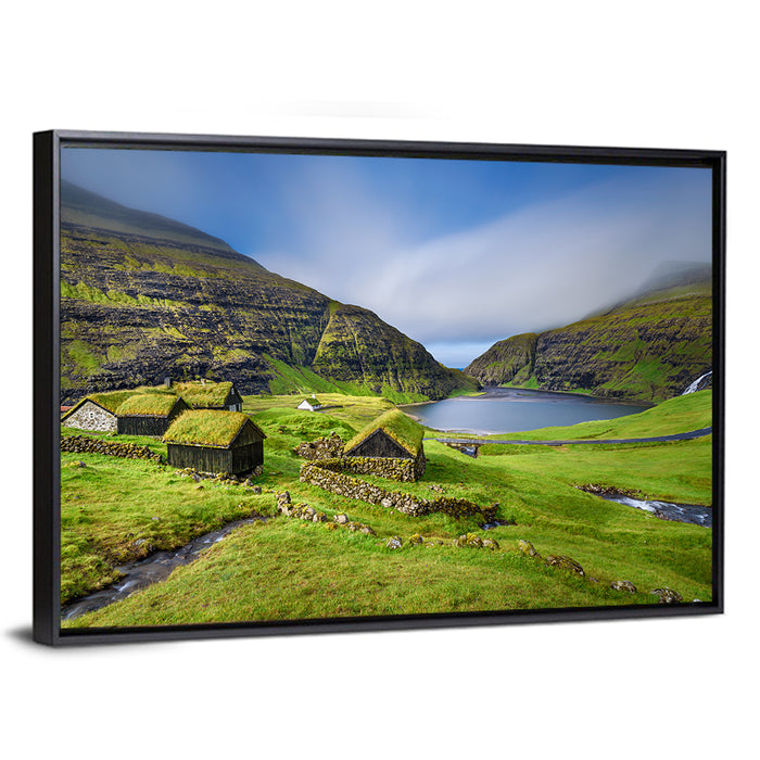 Saksun Turf Roof Cabins Wall Art as a framed canvas