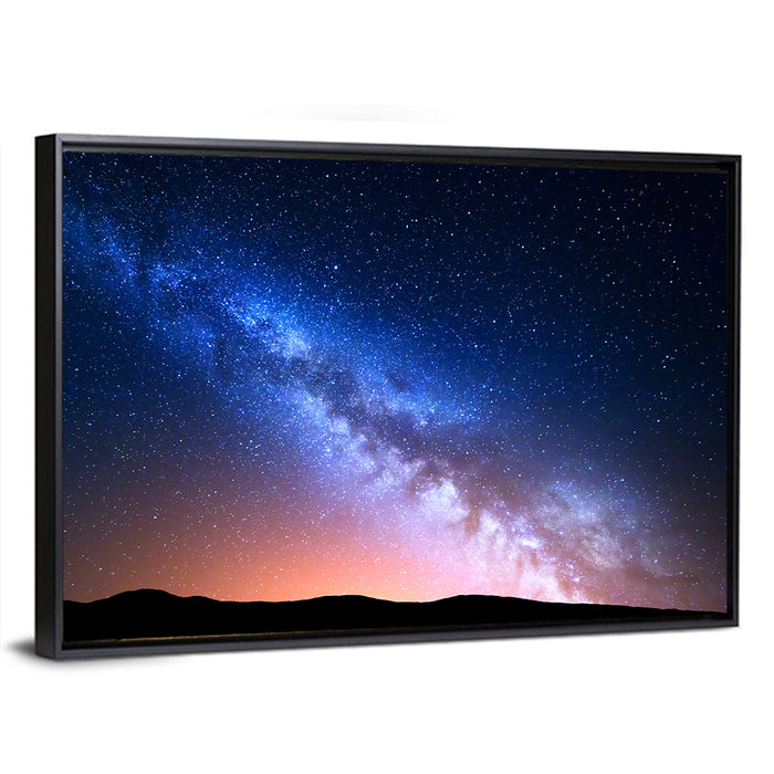 Milky Way Over Silhouetted Hills Wall Art as a framed canvas