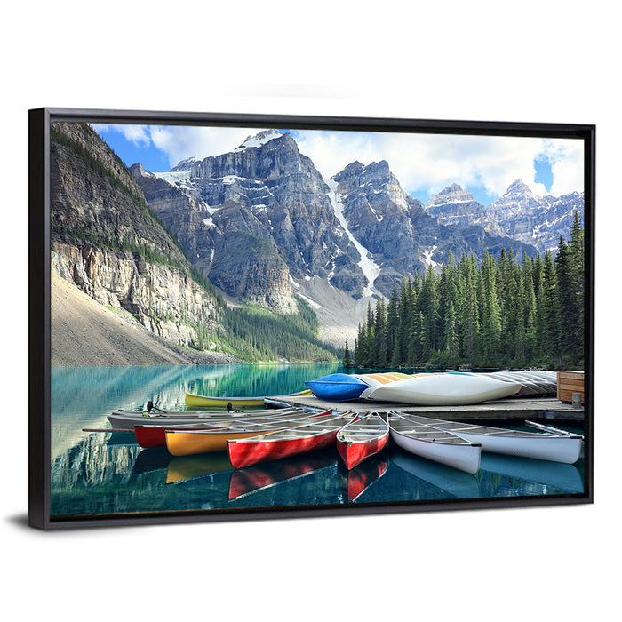 Moraine Lake Canoes at Lake Louise Wall Art as a framed canvas