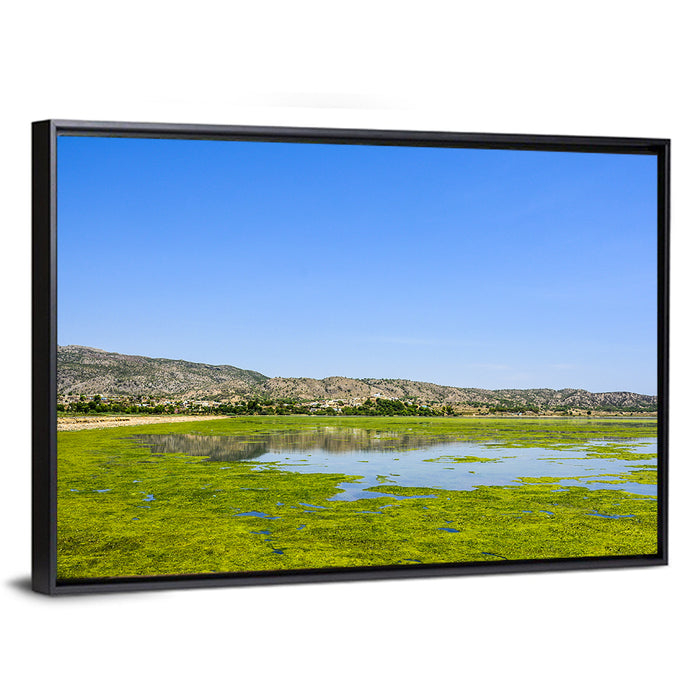 Uchali Lake Algae Reflection Wall Art as a framed canvas
