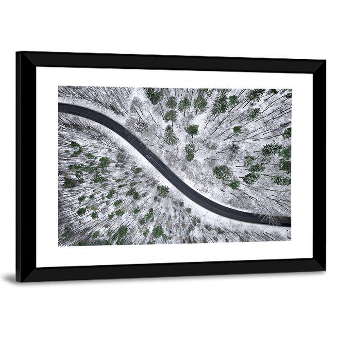 Snowy Forest Road Wall Art as a framed print
