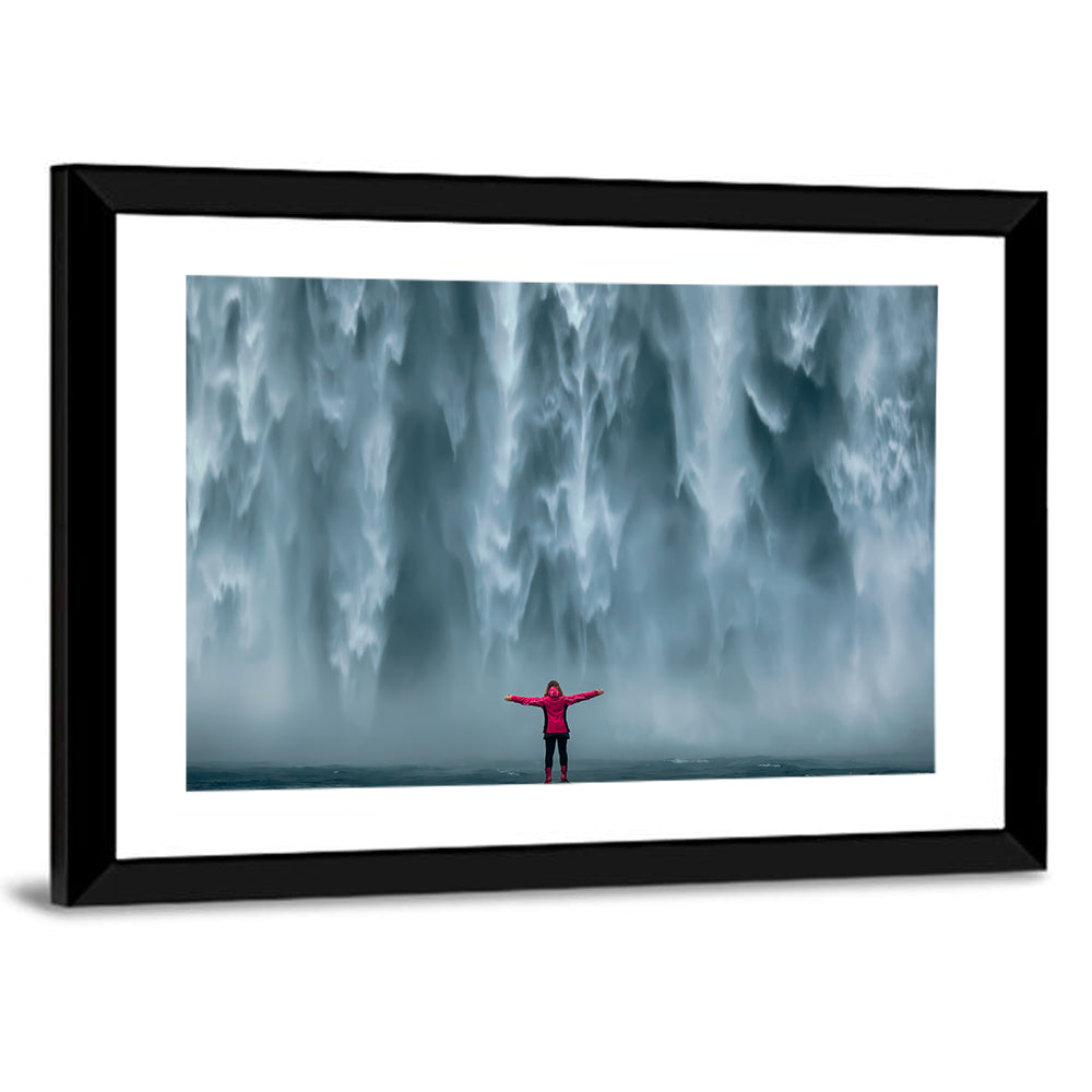 Skogafoss Waterfall with Figure in Pink Wall Art