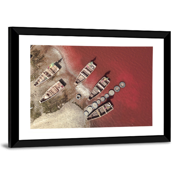 Wooden Boats on Lake Retba Wall Art as a framed print
