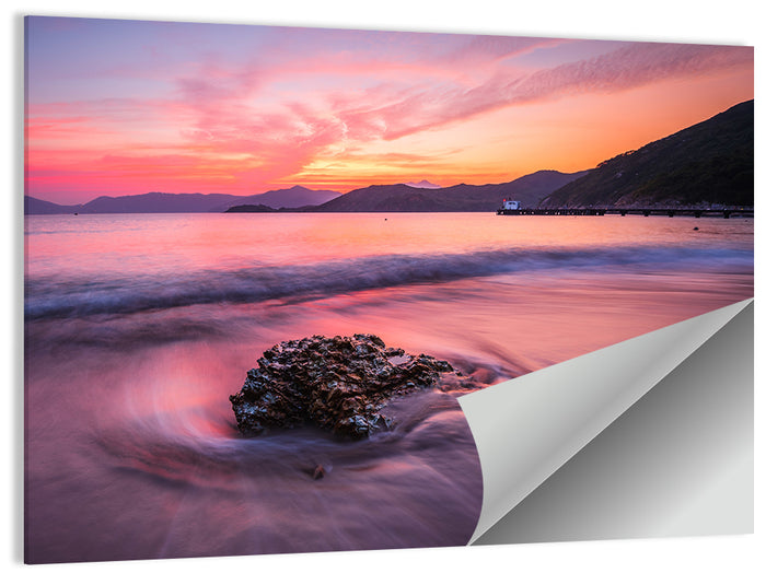 Pink Sunset Over Rock and Pier Wall Art as a poster print