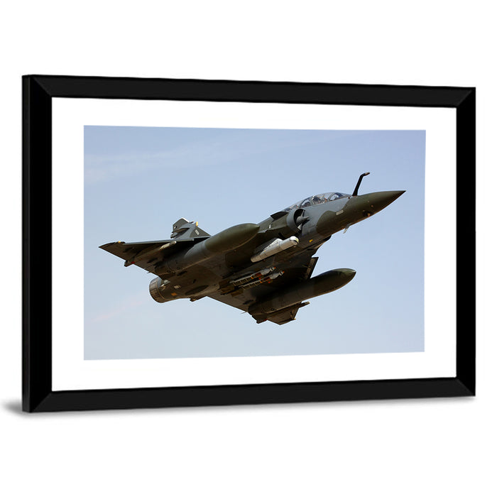 Camouflaged Fighter Jet in Flight Wall Art as a framed print