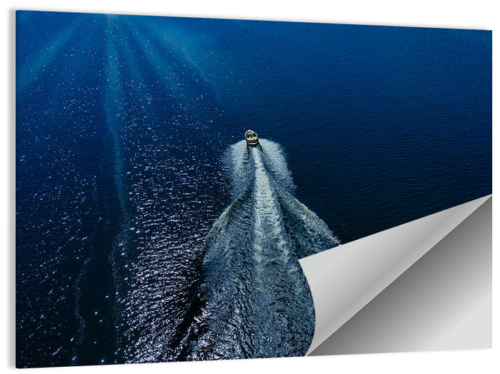 Aerial Boat Over Deep Blue Water Wall Art as a poster print