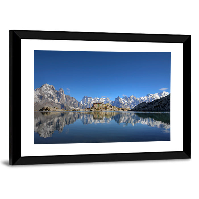 Stone Cabin on Mountain Lake Wall Art as a framed print