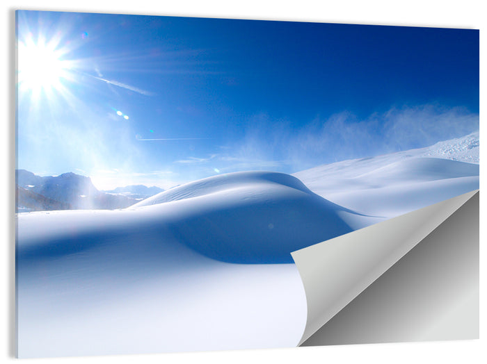 Sunlit Snow Dune Under Blue Sky Wall Art as a poster print